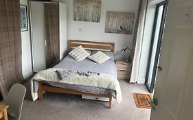 We Have 2 Rooms To Offer At Our Home - There Is A Very Large Downstairs Bedroom With Ensuite Or A Beautiful Bar B Q Lodge With 4 Sleeping Platforms With Its Own Separate Toilet And Shower Facility Opposite The Lodge - Please Book The Room You Want